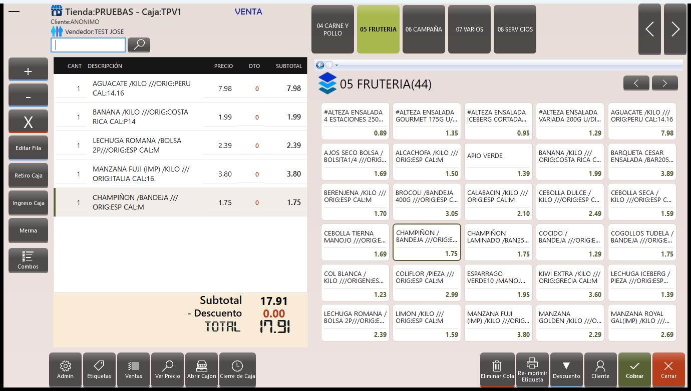 ISTPV cobrando: cesta con aguacate, plátano, lechuga, manzana y champiñón, total 17,91 €, con el catálogo de frutería al lado